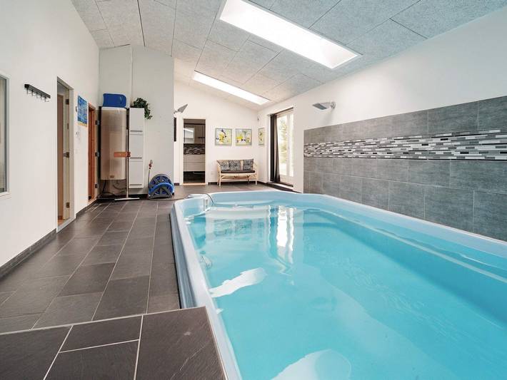 Ferienhaus für 8 Personen, mit Terrasse und Garten sowie Pool und Sauna in Rødby