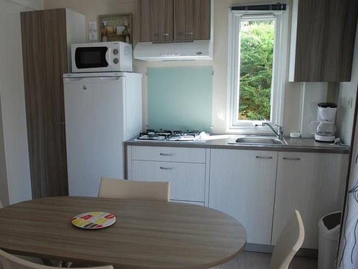 Mobil home pour 3 personnes, avec piscine et bassin pour enfant dans Plage des Conches - 4