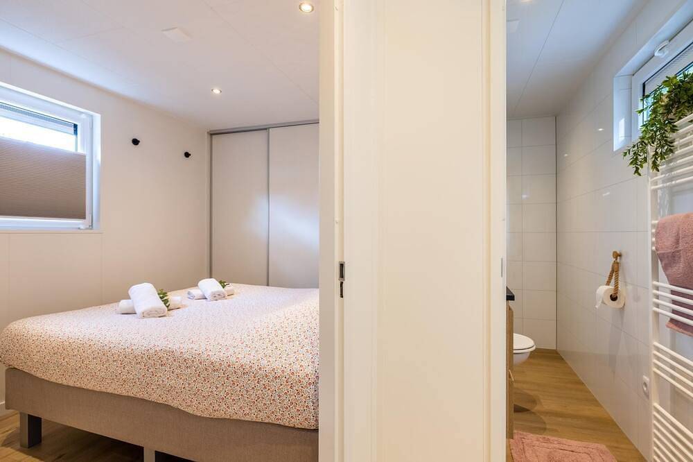 Luxuriöse Waldunterkunft mit Terrasse und Grill in Veluwe