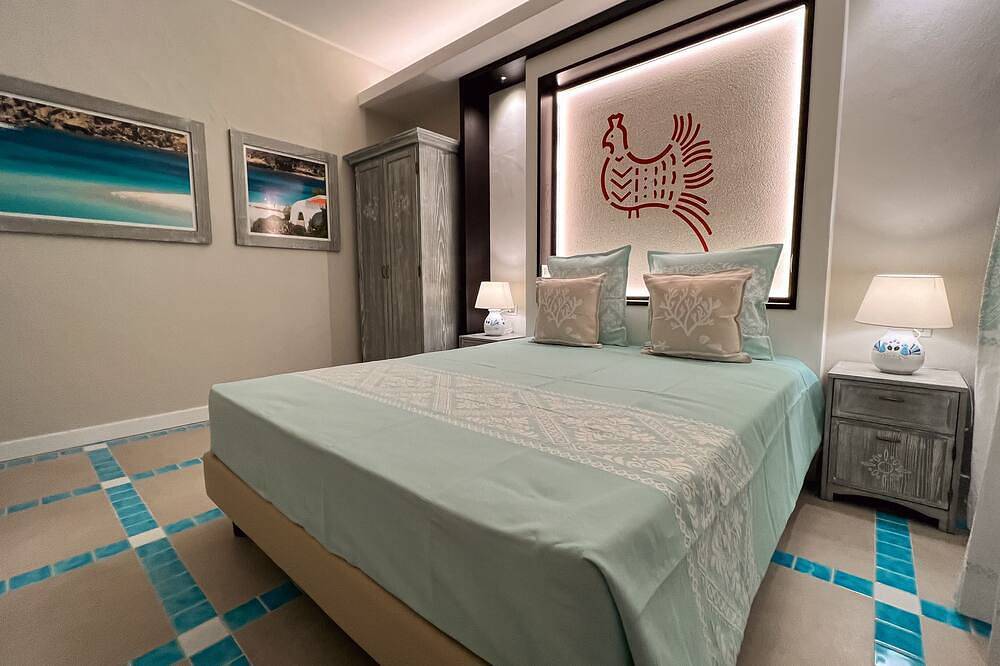 Apartamento entero, Villa Aquamarina Red Pavoncella in Playa de Porto Pino, Porto Pino