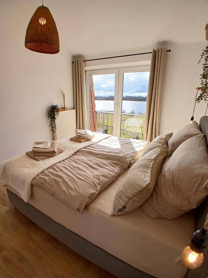Ganze Wohnung, One-Bedroom Apartment with Lake View in Strand am Timmeler Meer, Großefehn