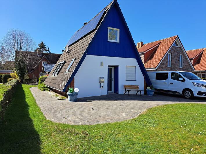 Ferienhaus für 5 Personen, mit Balkon und Garten sowie Seeblick in Landkreis Wittmund