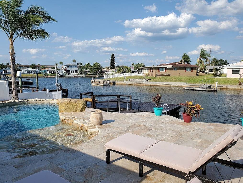 Gulf of Mexico Canal Cottage with Boat Dock and Heated Pool in Pasco County
