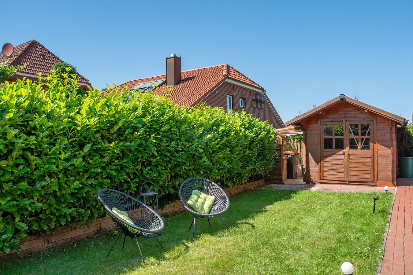 Ferienhaus 'Ginas Ferienhaus' in sehr ruhiger Wohnlage mit großem Garten in Nenndorf, Nordseeküste