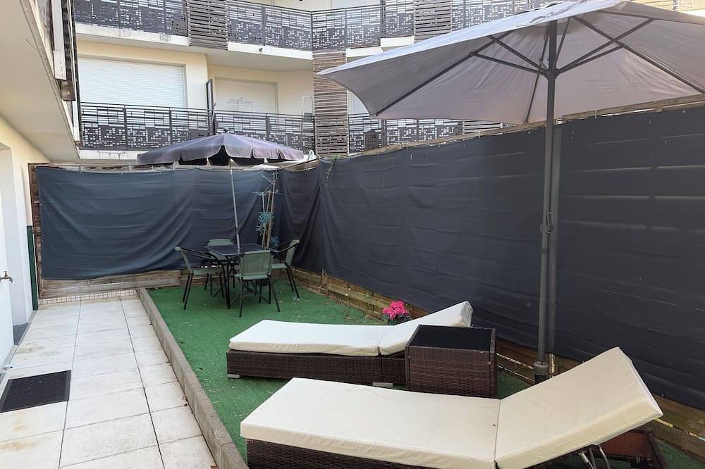 Ganze Wohnung, Charming one-bedroom apartment 9 km from Disneyland and 4 km from Val d'Europe, with private parking in Lagny-sur-Marne, Seine-et-Marne