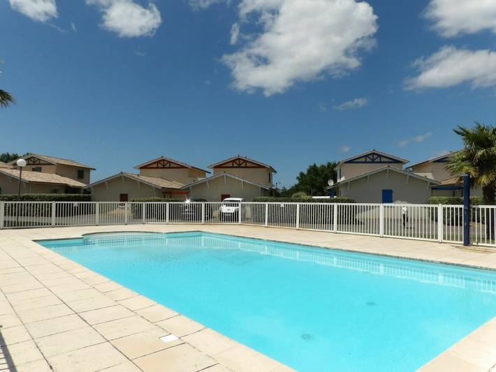Appartement de vacances pour 5 personnes, avec Terrasse ainsi que Jardin et Piscine
