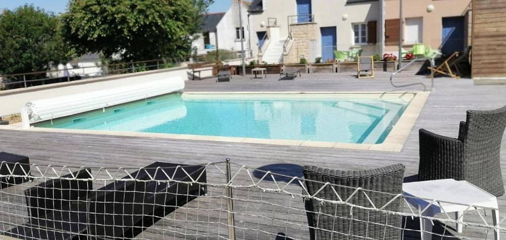 Gîte pour 3 personnes, avec jardin et bassin pour enfant ainsi que vue et piscine dans Office De Tourisme Du Guilvinec