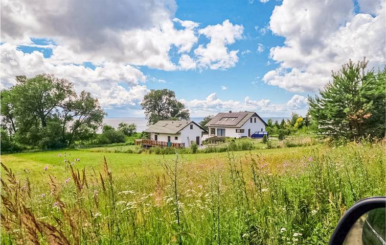Ferienhaus für 8 Personen, mit Terrasse und Sauna sowie Seeblick