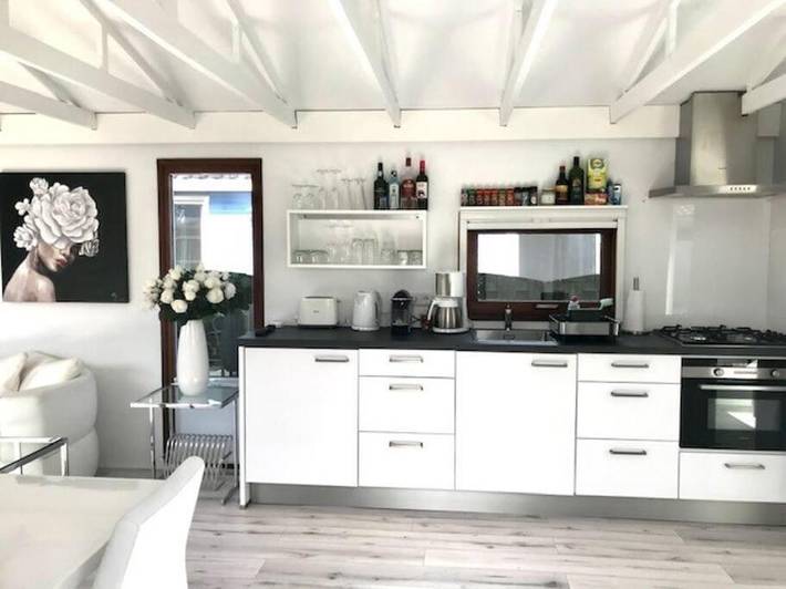 Ferienhaus für 4 Personen, mit Terrasse und Garten sowie Ausblick und Seeblick in Wervershoof