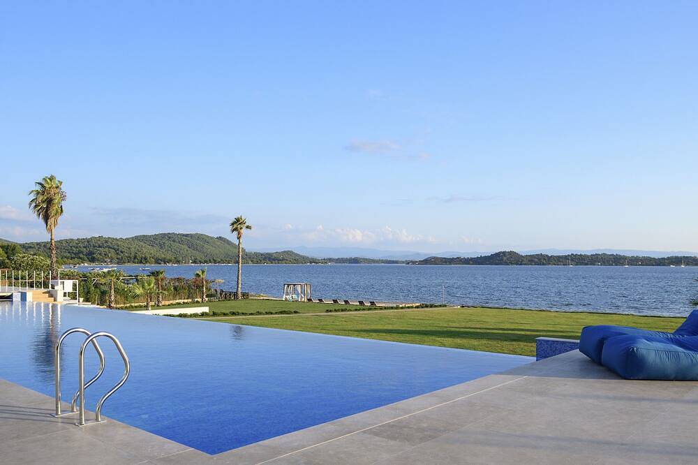 Beachfront Villa Natalia with Two Private Pools in Vourvourou, Chalkidiki