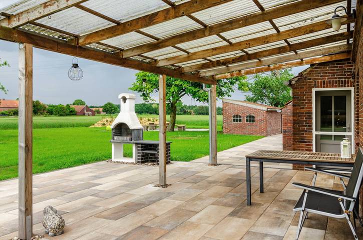 Casa de Férias 'Ferienhaus Lüttje Dörp' com terraço privado, jardim privado e Wi-Fi in Blomberg (Ostfriesland), Wittmund (distrito)