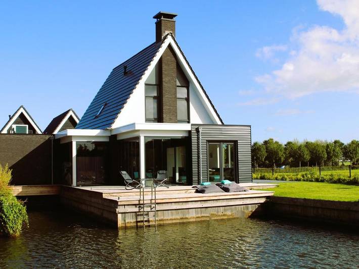 Ferienhaus für 7 Personen, mit Terrasse und Garten sowie Sauna und Seeblick
