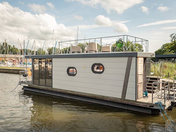 Ferienhaus für 4 Personen, mit Balkon/Terrasse und Terrasse sowie Garten in Warns
