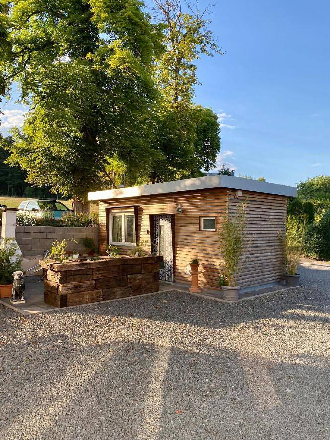 Ferienhaus für 3 Personen, mit Whirlpool und Terrasse sowie Garten und Sauna