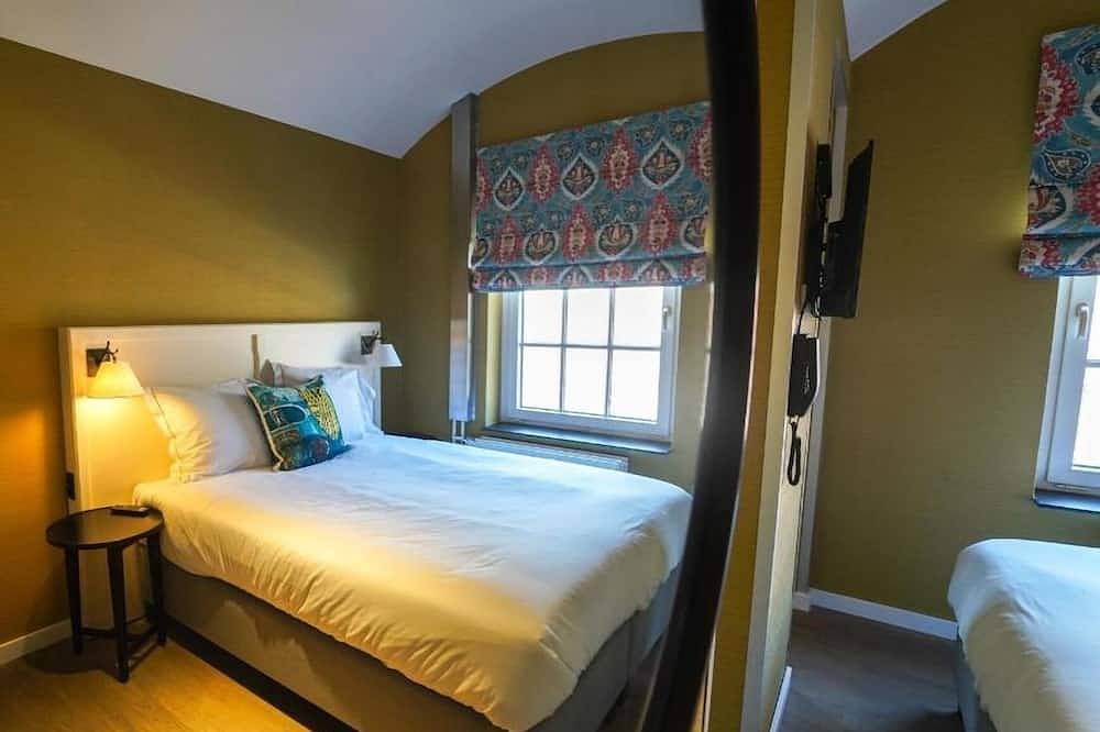 Historic Ambiance in Modern Cell Room in Nederlandse Noordzeekust