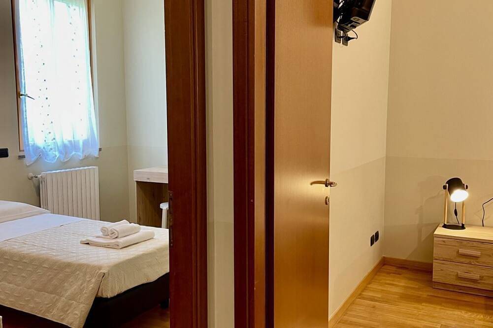 Entire apartment, Bnbook – Stylish Comfort and Quiet Living Near Milan, up to 6 personspacious 4-room apartment with a Provençal touch, surrounded by greenery and perfect for families or business stayswelcome to your peaceful retreat in Rho! Nestled inside a charming c in Rho, Milan Province