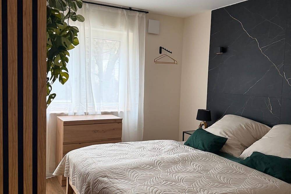 Ganze Wohnung, Moderne Erdgeschoss-Wohnung mit Garten - ideal für Kur & Klinik in Bad Krozingen, Südschwarzwald