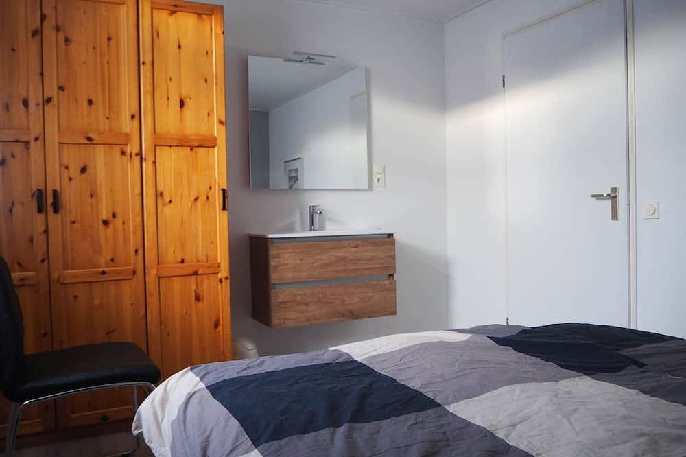Comfortabele en zonnige bungalow bij strand, duinen en bloemvollenvelden in Sint Maartensvlotbrug, Nederlandse Noordzeekust