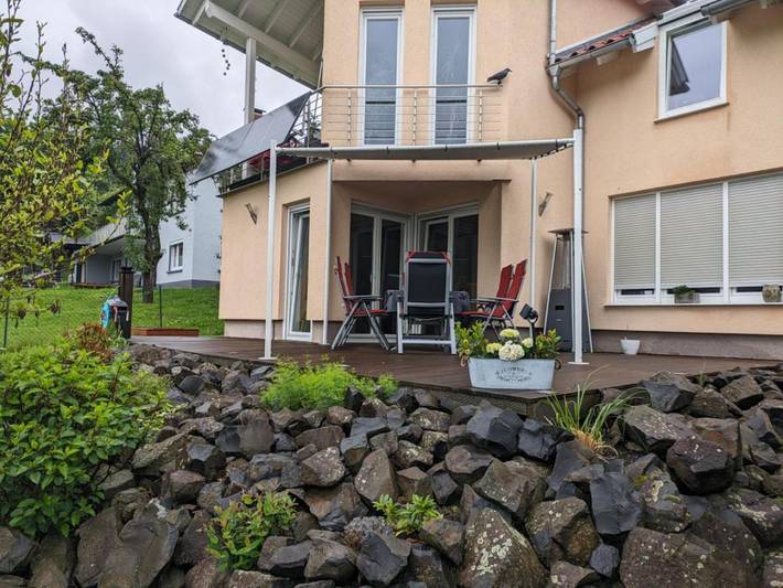 Ferienwohnung für 2 Personen, mit Terrasse und Garten sowie Ausblick