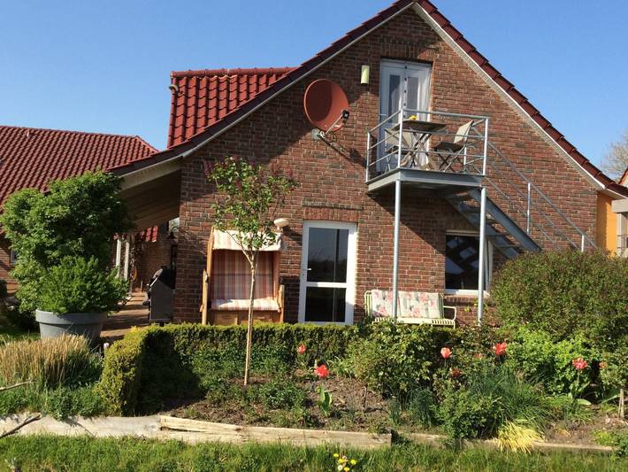 Ferienwohnung für 3 Personen, mit Balkon und Terrasse sowie Garten in Großheide