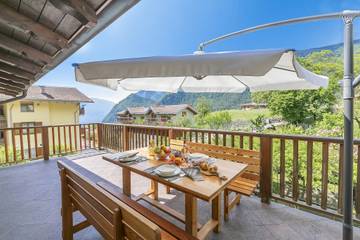 Ferienhaus für 5 Personen, mit Balkon und Seeblick, kinderfreundlich in Tenno