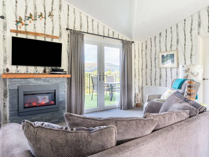 Ferienhaus für 6 Personen, mit Balkon und Terrasse sowie Garten und Seeblick in Perthshire