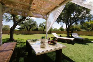 Ferienhaus für 7 Personen, mit Balkon und Garten in Laganas