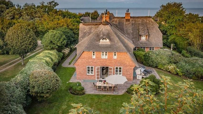 Ferienhaus mit Meerblick für 8 Personen, mit Terrasse und Sauna sowie Garten