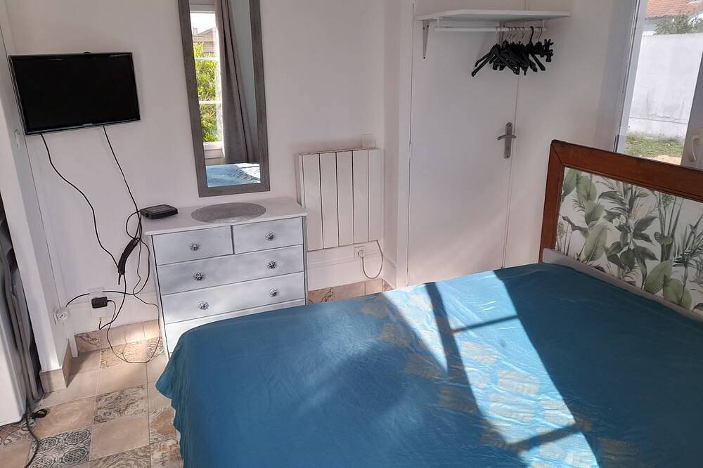 Apartamento entero, La Datcha in a 900m2 garden planted with banana trees, agapanthus and oleanders in Saujon, Côte de Beauté