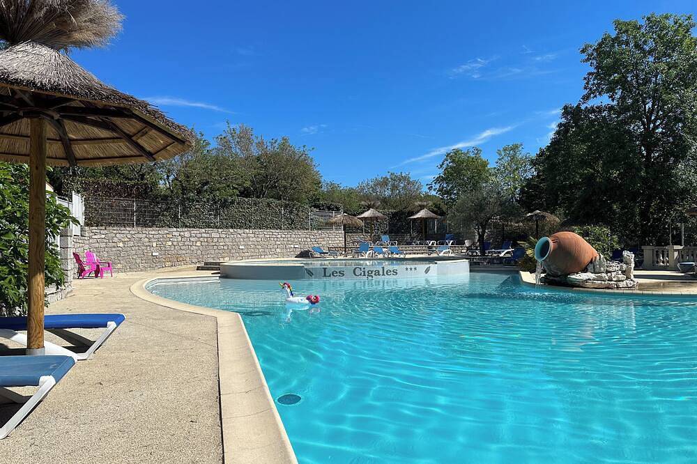 Location mobil home/chalet dans joli camping familial in Berrias-et-Casteljau, Parc national des Cévennes