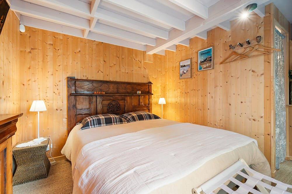 Casa de huéspedes 'La Cabane dans les charmes' con terraza privada, jardín común y Wi-Fi in Pleudihen-sur-Rance, Región de Dinan