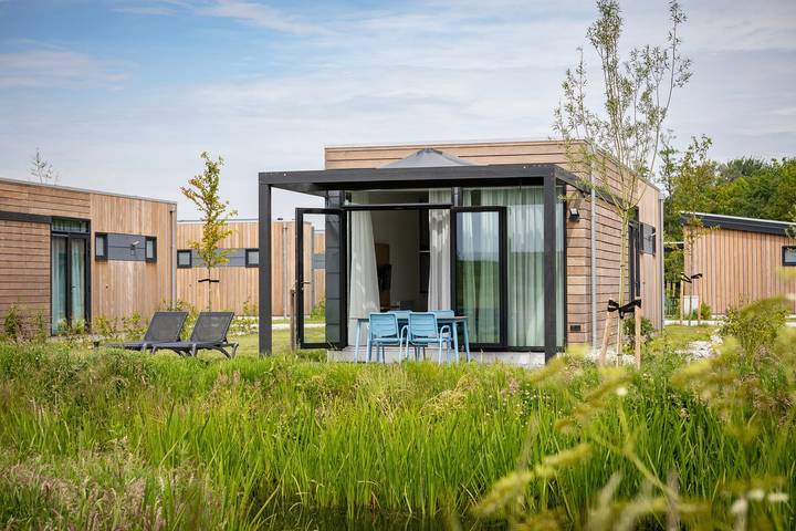Ferienhaus für 4 Personen, mit Balkon/Terrasse und Terrasse sowie Garten