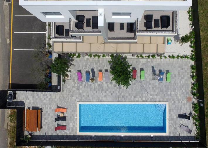 Maison d’hôte pour 6 personnes, avec jardin ainsi que vue et piscine à Trogir