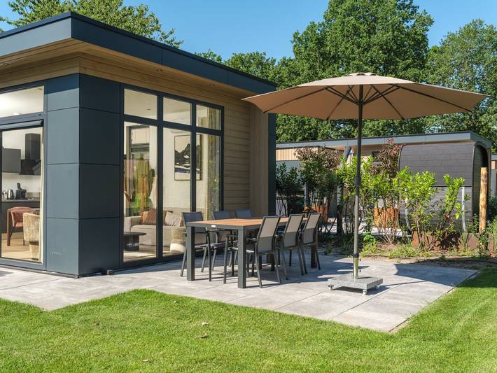 Ferienhaus für 6 Personen, mit Balkon/Terrasse und Terrasse sowie Garten und Sauna