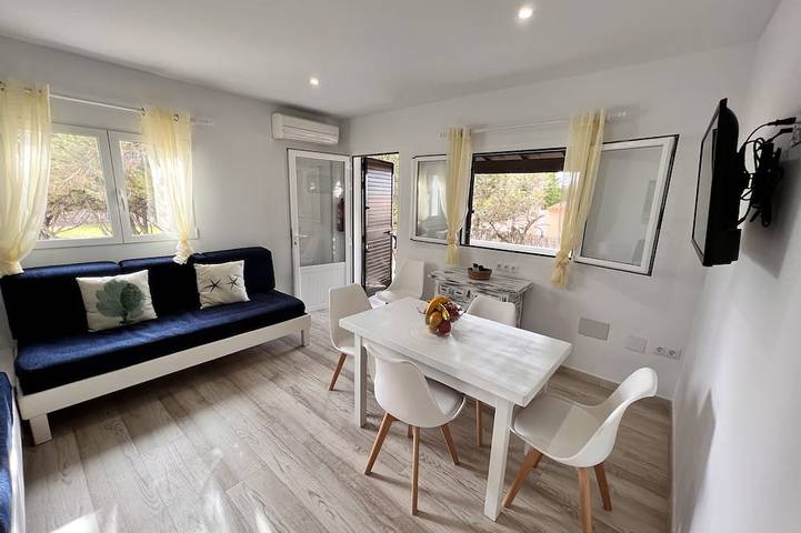 Ferienhaus für 4 Personen, mit Terrasse und Garten