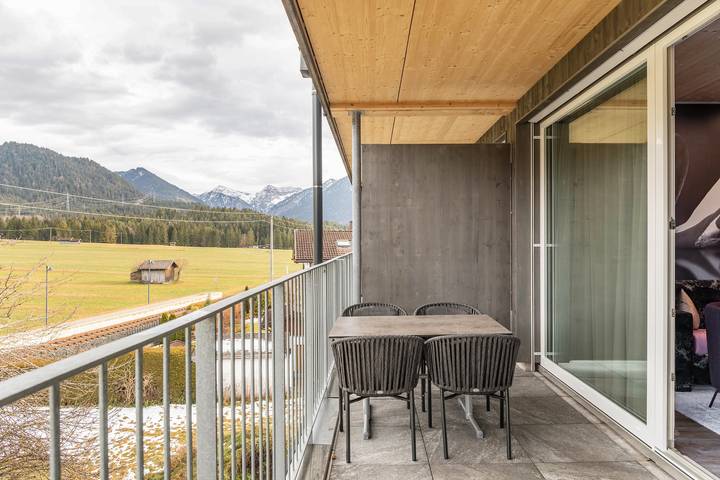 Appartement entier, Schwanen-Nest : vue sur les montagnes, balcon et Wi-Fi in Pflach, District de Reutte