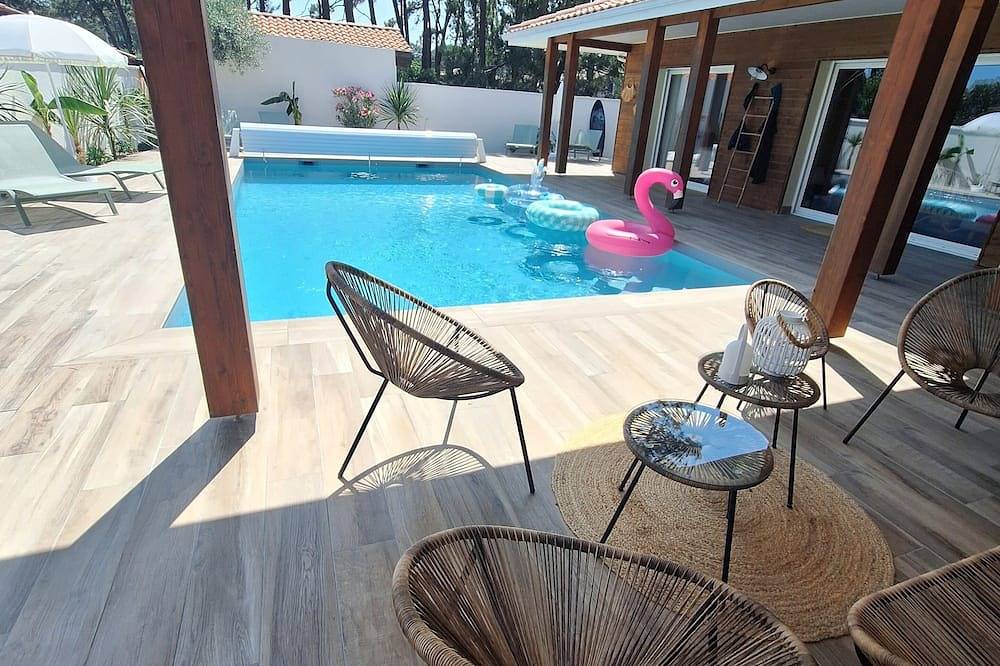 Sublime villa landaise, 220m2, avec piscine  chauffée,Jacuzzi, près de la mer. in Mimizan, Côte d’Argent