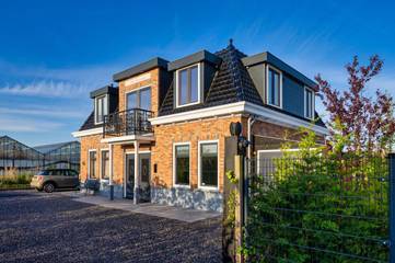 Location de vacances pour 7 personnes, avec vue ainsi que sauna et jardin dans Roelofarendsveen