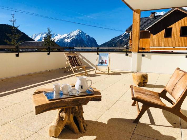 Appartement entier, Appartement "Cocooning-sauna-jacuzzi" avec vue montagne, terrasse privée et Wi-Fi in Vaujany, Parc national des Écrins