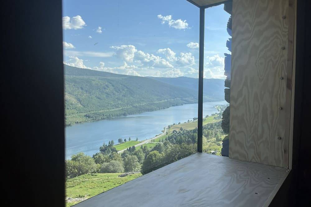 Architect designed sleeping box in barn in Ål
