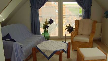 Ferienwohnung für 2 Personen, mit Ausblick und Garten, kinderfreundlich in Neßmersiel