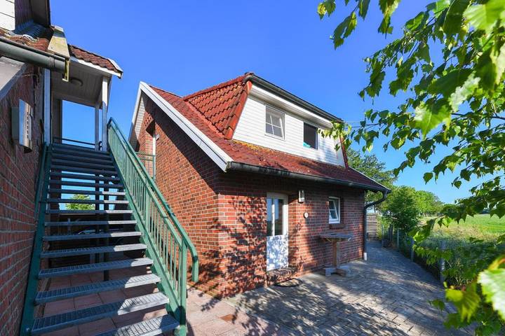 Ferienwohnung für 2 Personen, mit Terrasse und Garten sowie Ausblick in Neugarmssiel - 4