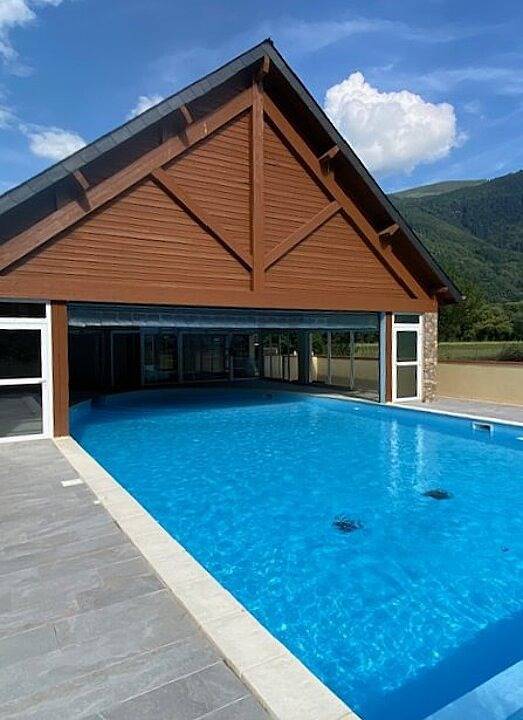 Appartement de vacances pour 6 personnes, avec jardin et balcon ainsi que piscine et vue sur le lac