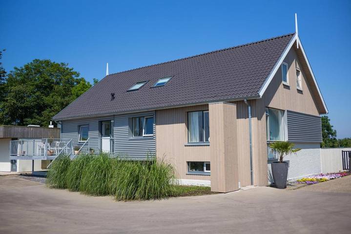 Ferienhaus für 8 Personen, mit Balkon und Terrasse sowie Garten und Ausblick