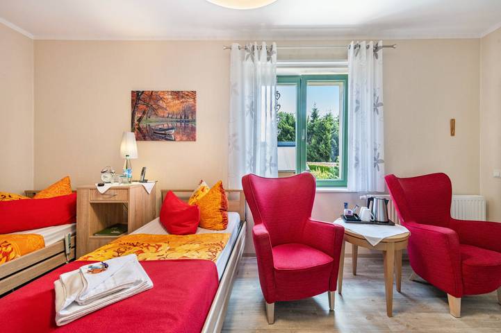 Chambre « Doppelzimmer Rot » avec jardin partagé et Wi-Fi in Meyenburg, Prignitz