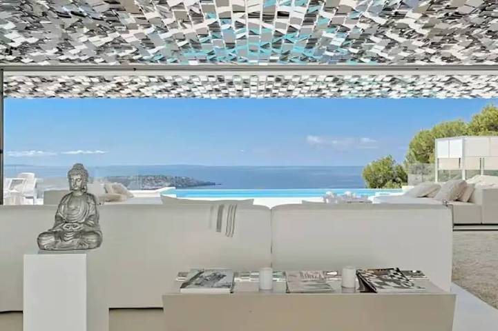 Villa pour 12 personnes, avec jacuzzi ainsi que jardin et sauna à Es Cubells