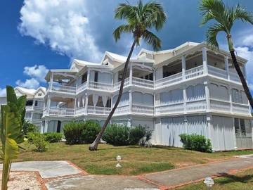 Gîte pour 2 personnes, avec vue ainsi que piscine et jardin dans Nettlé Bay