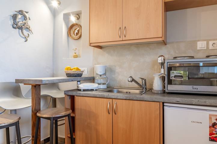 Casa de vacaciones 'Porto Galini Tinos Triantaros 104' con terraza, Wi-Fi y aire acondicionado in Tinos