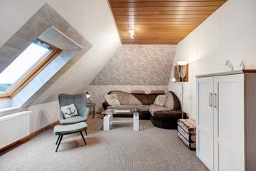 Ferienwohnung 'Deichblick 1' mit Gemeinschaftsgarten und -balkon