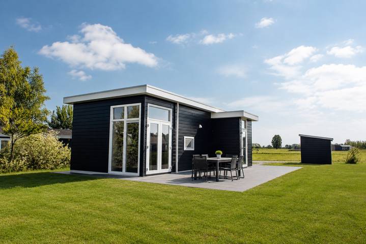 Maison de vacances pour 2 personnes, avec terrasse et bassin pour enfant ainsi que vue sur le lac et balcon/terrasse dans Drenthe